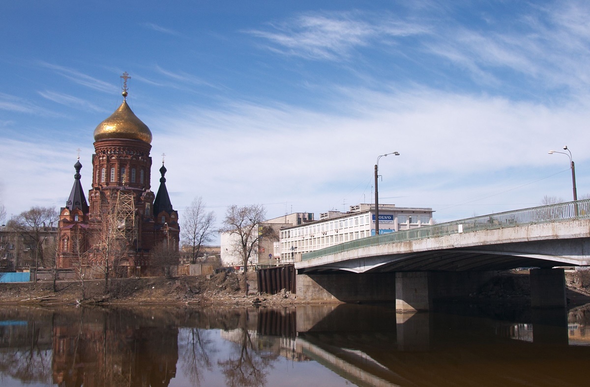 Gutuevskiy Bridge in Saint Petersburg with the Epiphany Churh